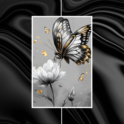 Stunning black white gold art of a butterfly in flight over a white flower.