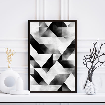 Black and white abstract wall art with a bold triangle pattern