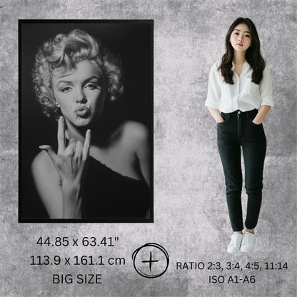 Woman standing next to a framed black and white portrait of a famous actress on a textured wall.