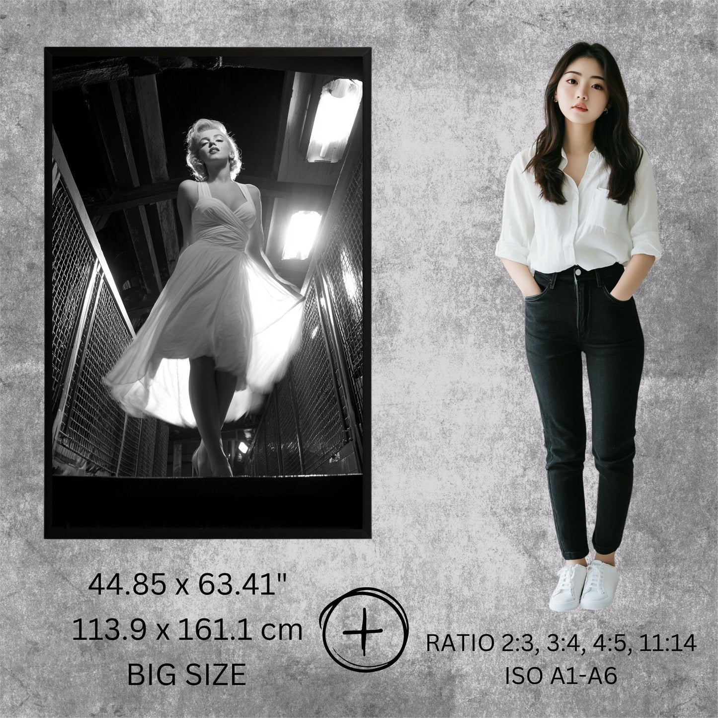 Woman standing next to a framed black and white photo of a woman in a dress on a textured gray wall.