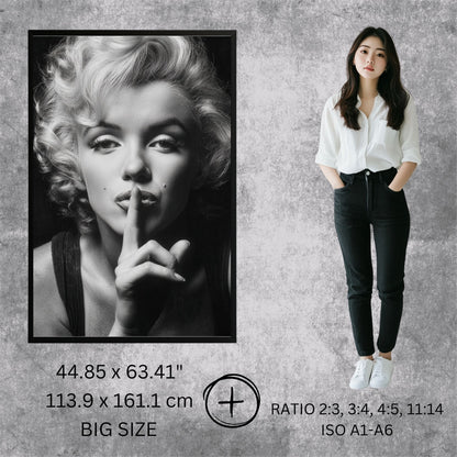 Person standing next to a framed black and white portrait of a famous actress on a textured wall.