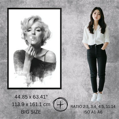 Woman standing next to a framed black and white portrait of a famous actress on a gray wall.