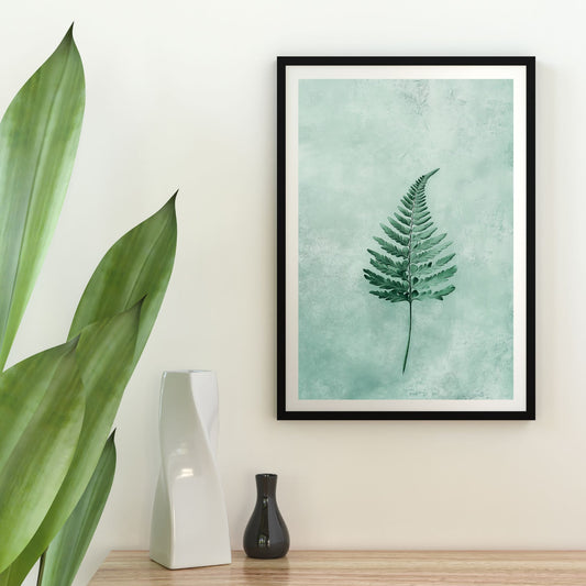 Minimalist botanical wall art featuring a single green fern