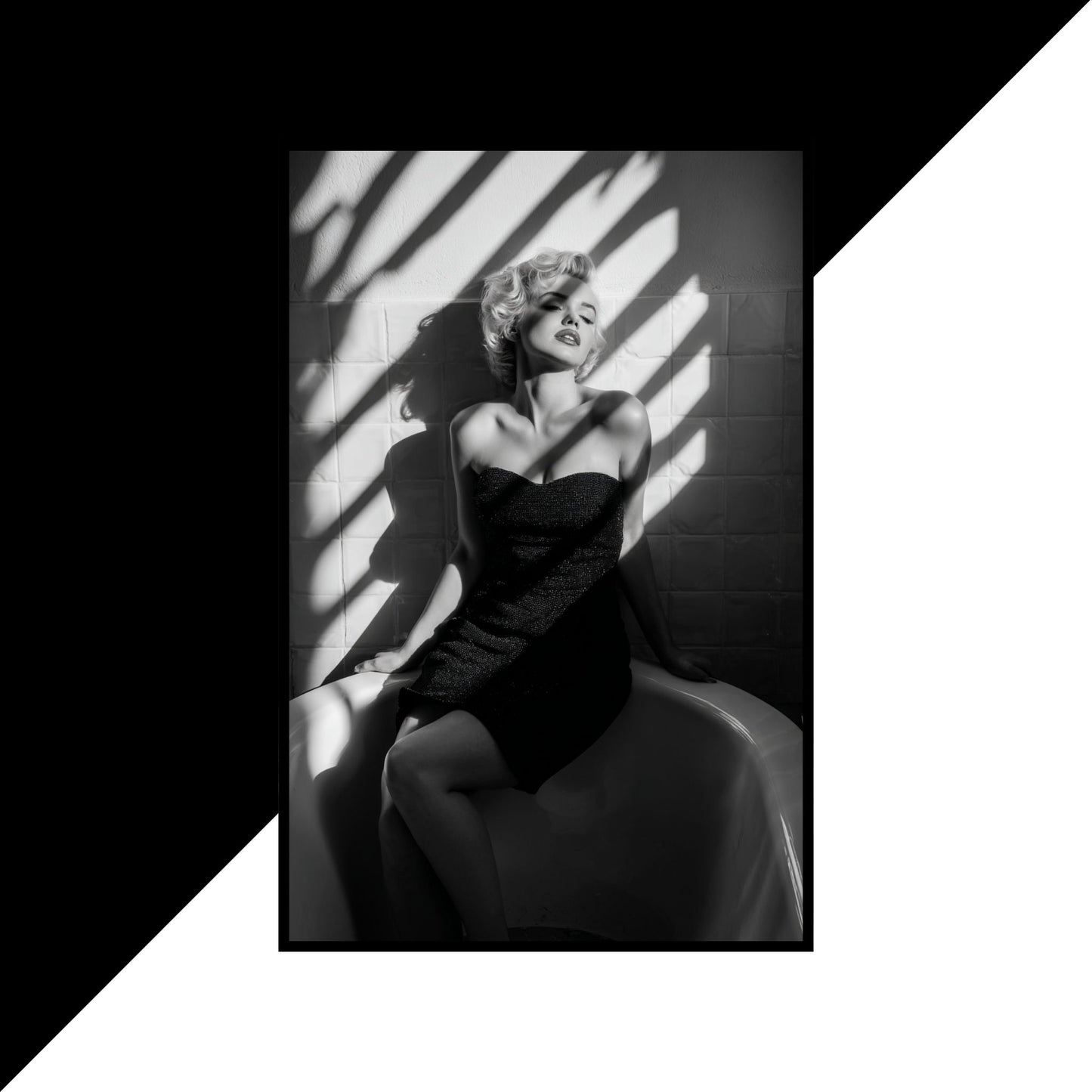Black and white portrait of Marilyn Monroe sitting with shadows on a textured wall.