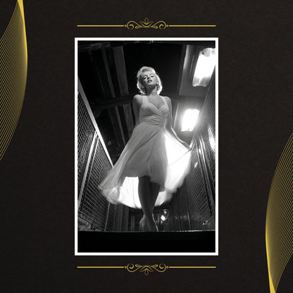 Black and white photo of a woman in a dress with decorative gold elements on a black background