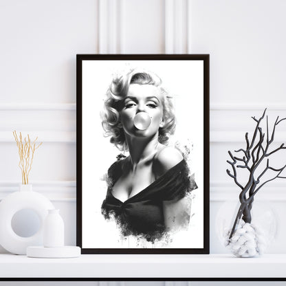 Framed black and white portrait of a famous actress on a white wall.