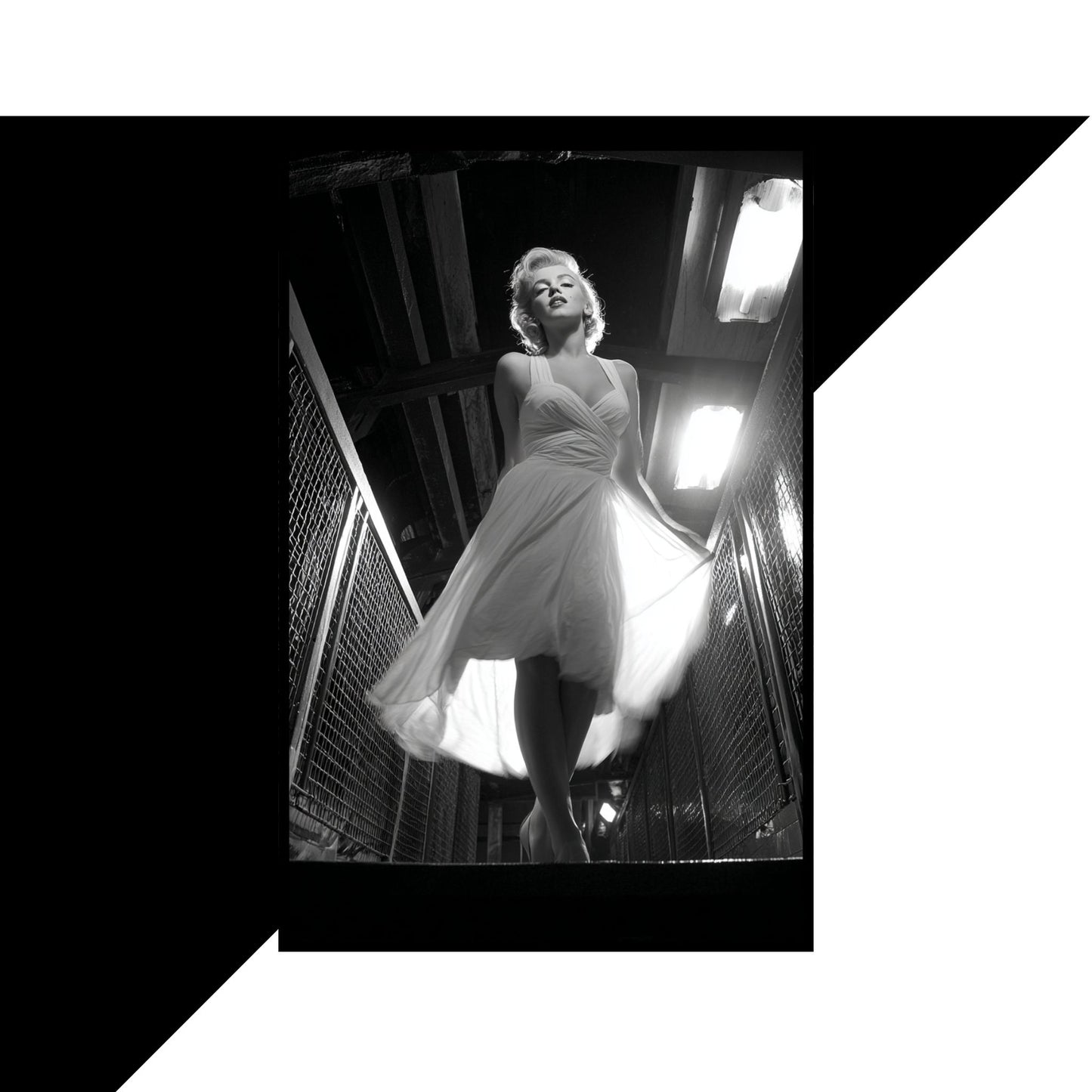 Black and white photo of a woman in a dress standing in an urban setting.